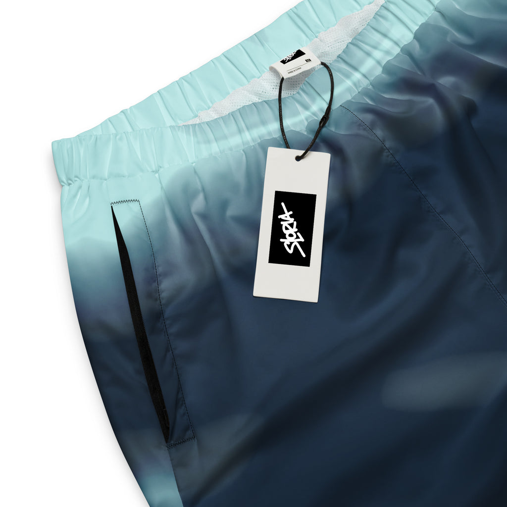 Gradient blue shorts with a S.Loria brand tag on a white background
