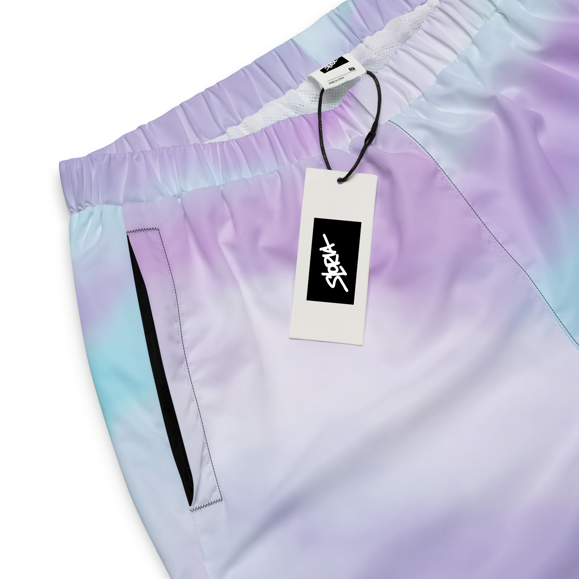 Gradient shorts with a Loria NYC Art brand tag on a white background