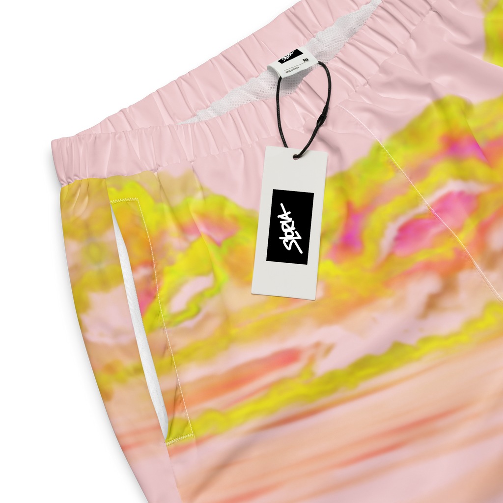 Colorful tie-dye Loria NYC Art pants with a brand tag on a white background