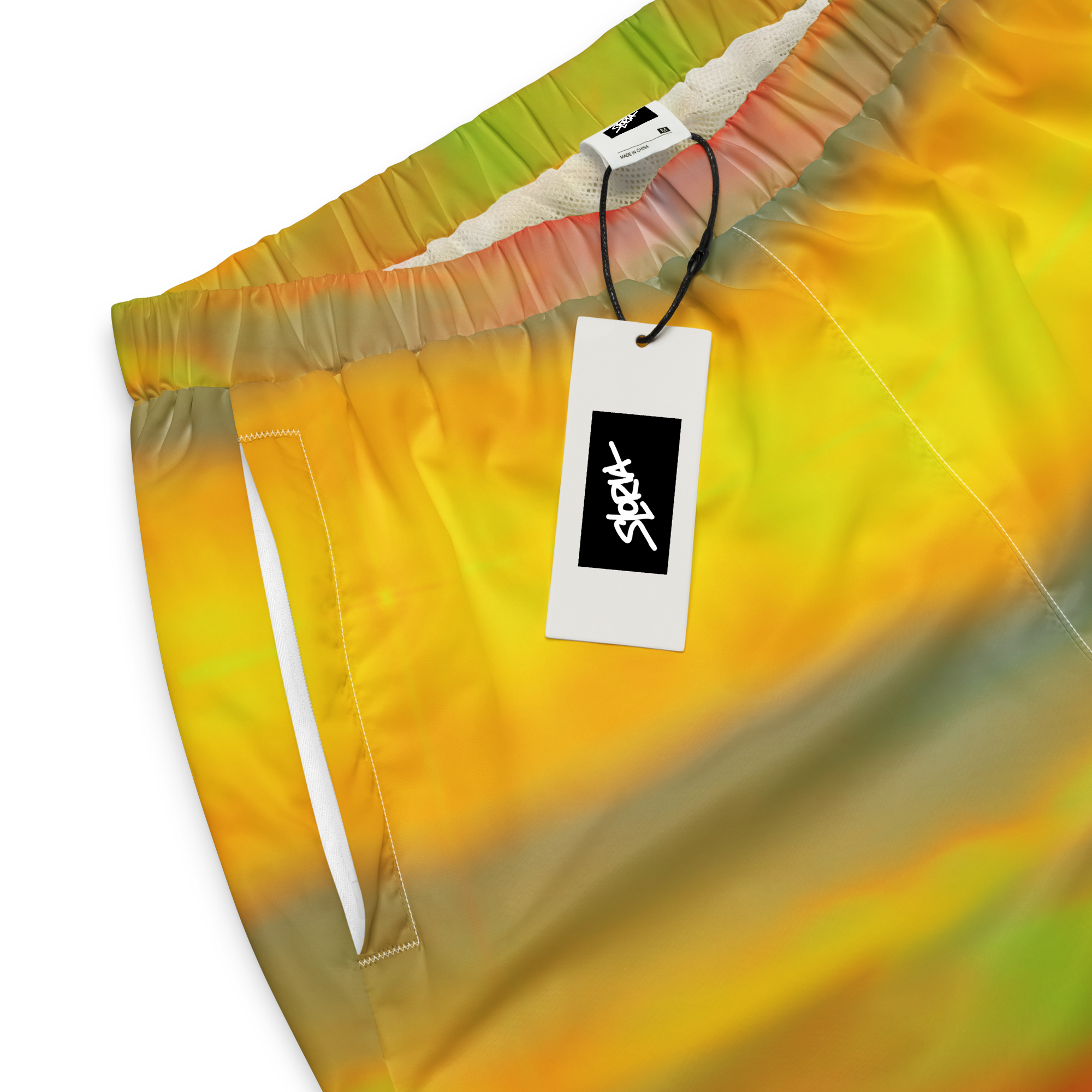 Tie-dye shorts with a Loria NYC Art brand tag on a white background