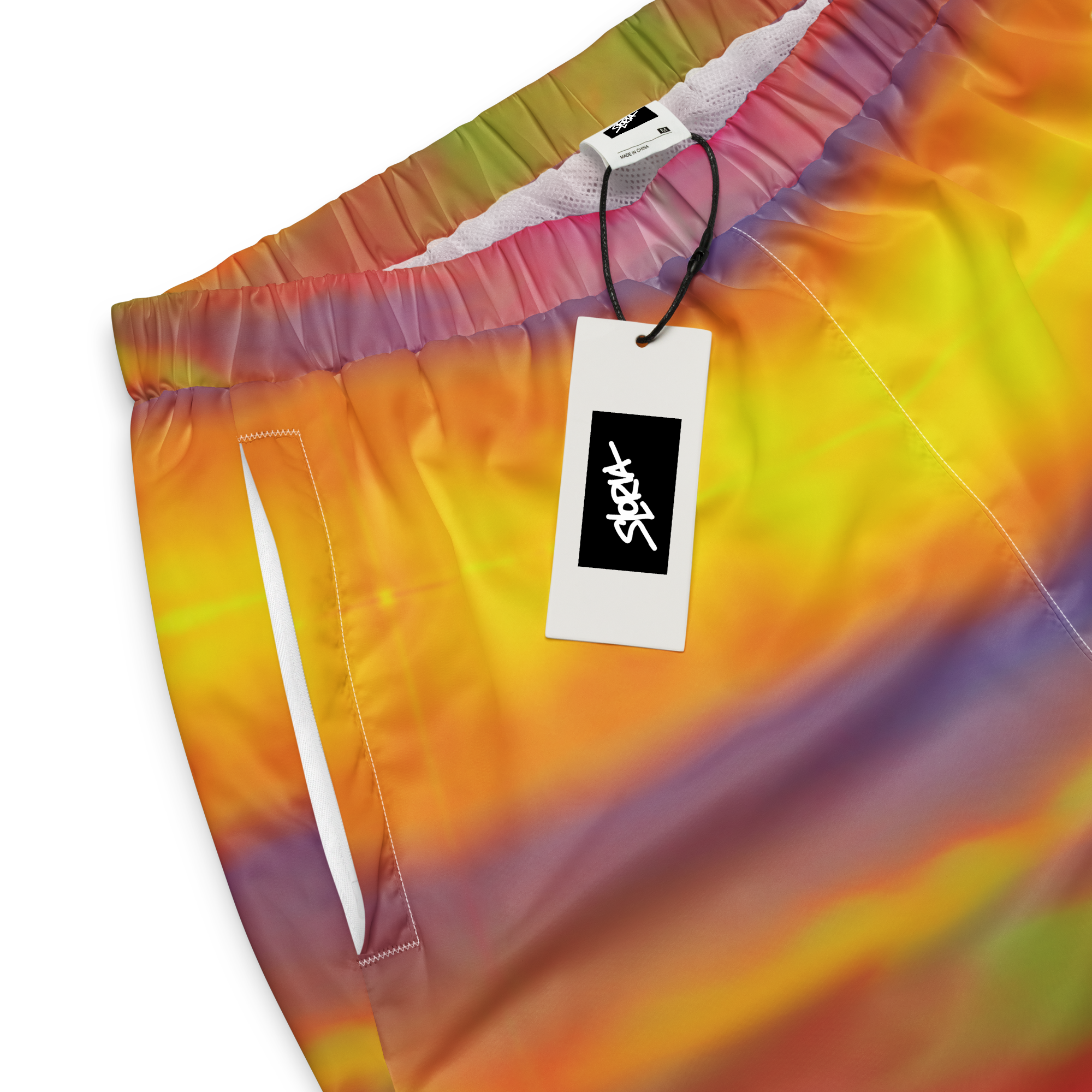 Tie-dye shorts with a Loria NYC Art brand tag on a white background