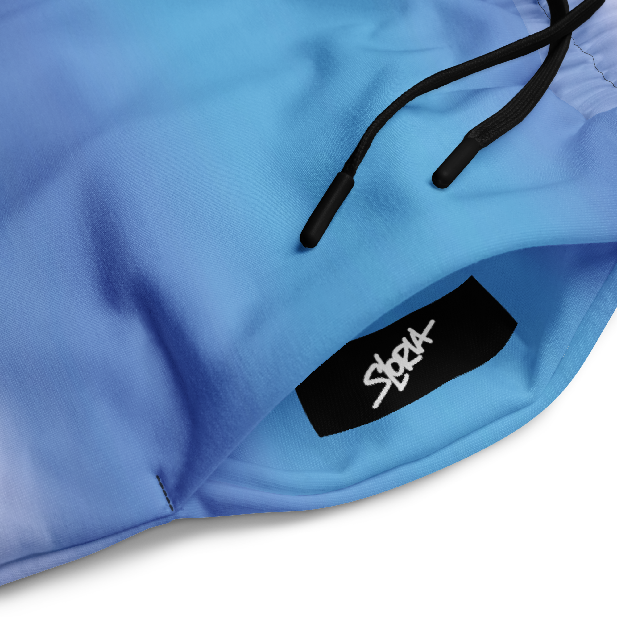 Loria NYC Art Blue jacket with a black label featuring the brand 'SLoria' on a white background