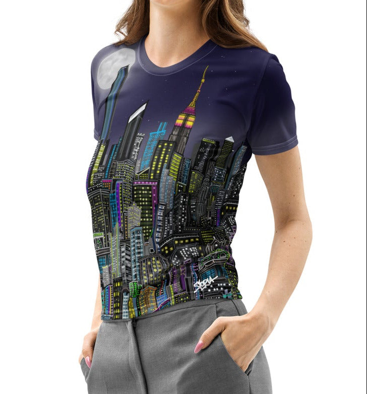 Woman wearing a Loria NYC Art cityscape t-shirt on a white background