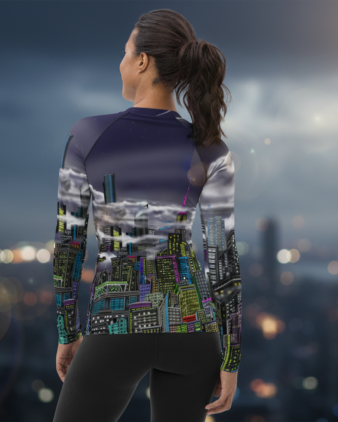 Person wearing a colorful Loria NYC Art athletic outfit overlooking a cityscape at night.