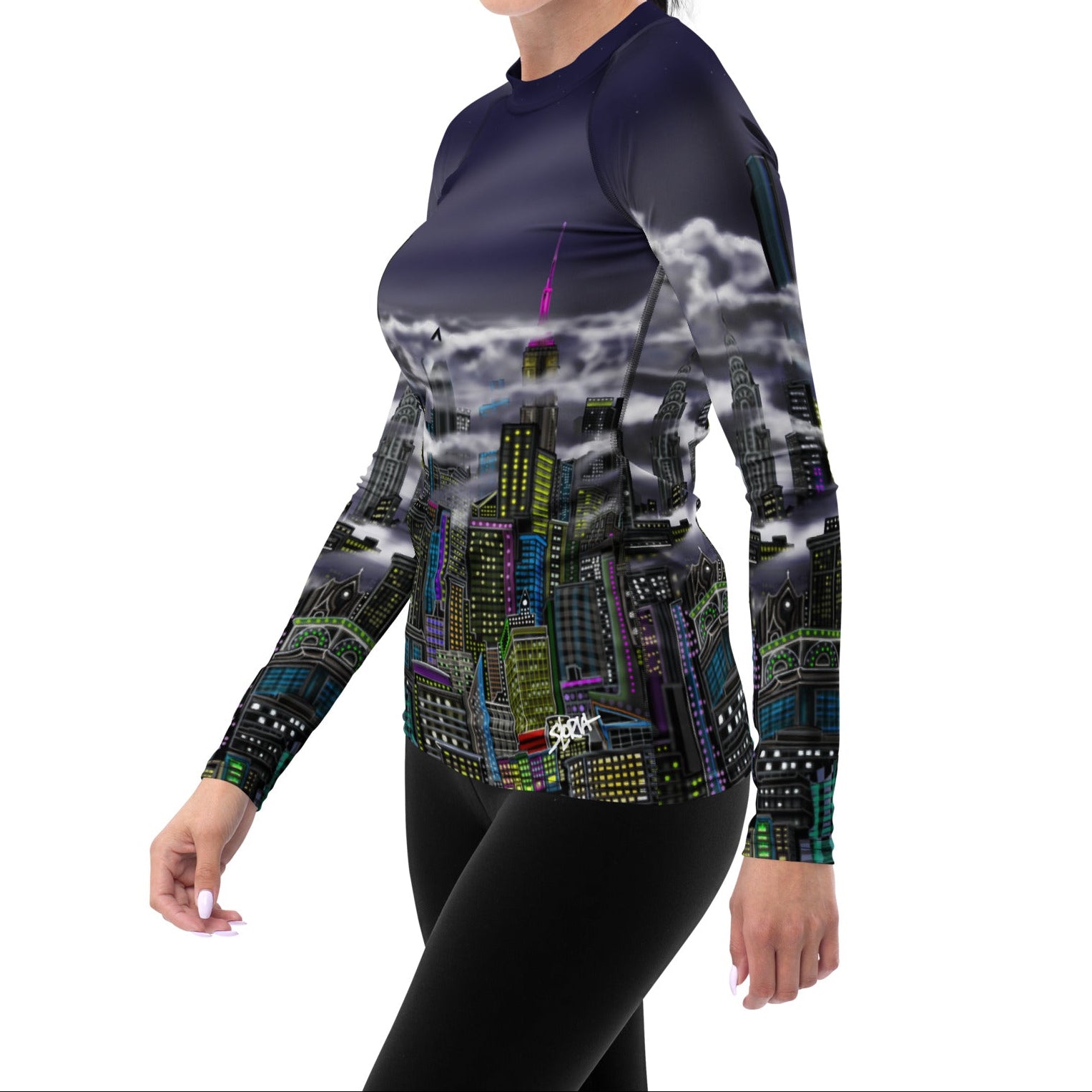 Women wearing a Rash Guard shirt with a Loria NYC Art skyline design