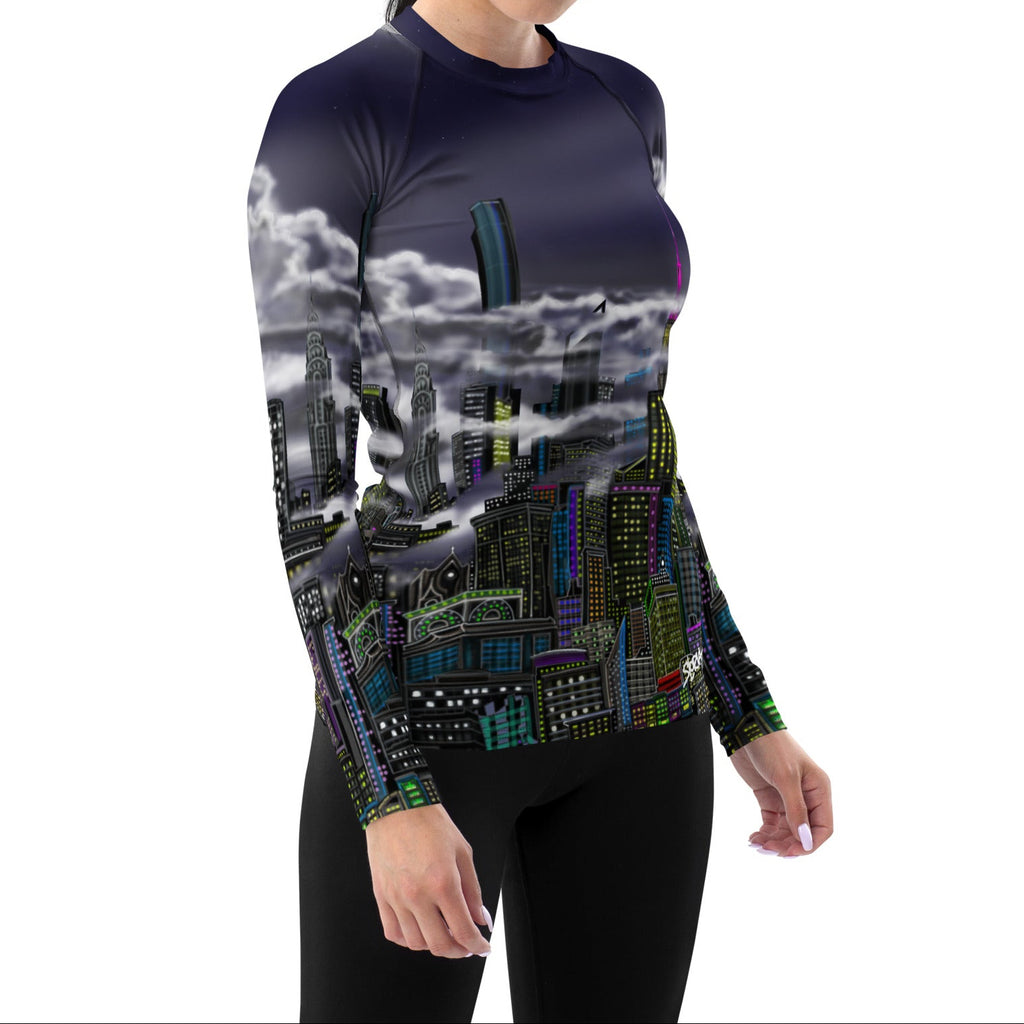 Women posing in a Loria NYC Art shirt on a white background.