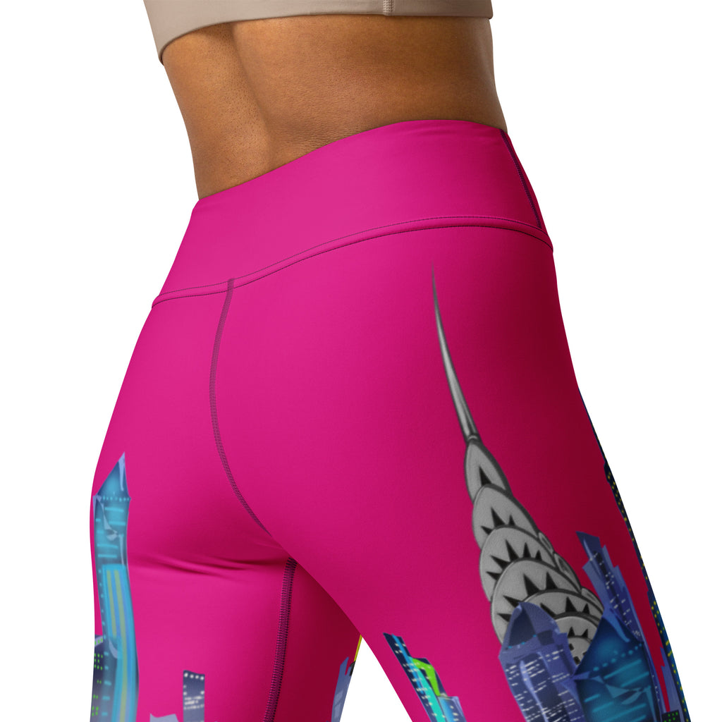 Pink leggings with Loria NYC Art cityscape design on a white background