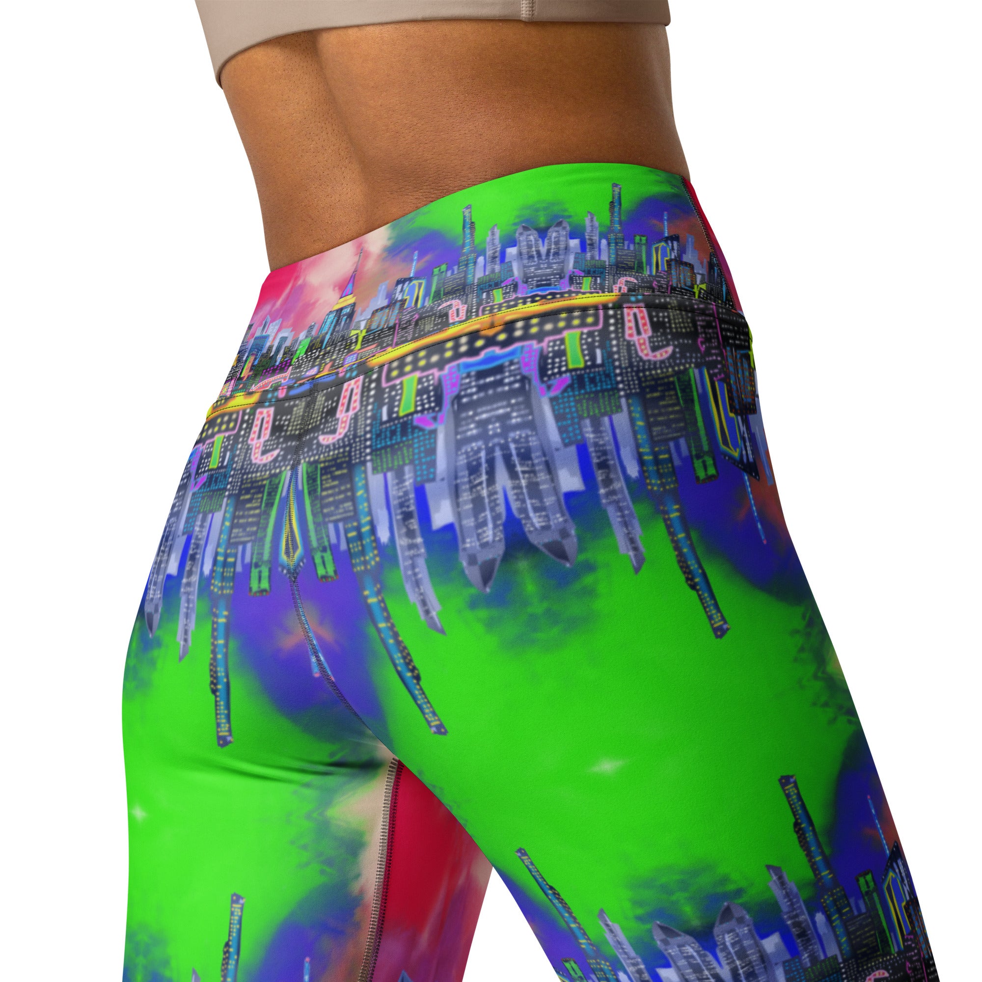 Multicolored tie-dye leggings designed by Loria NYC Art and worn by a person on a white background