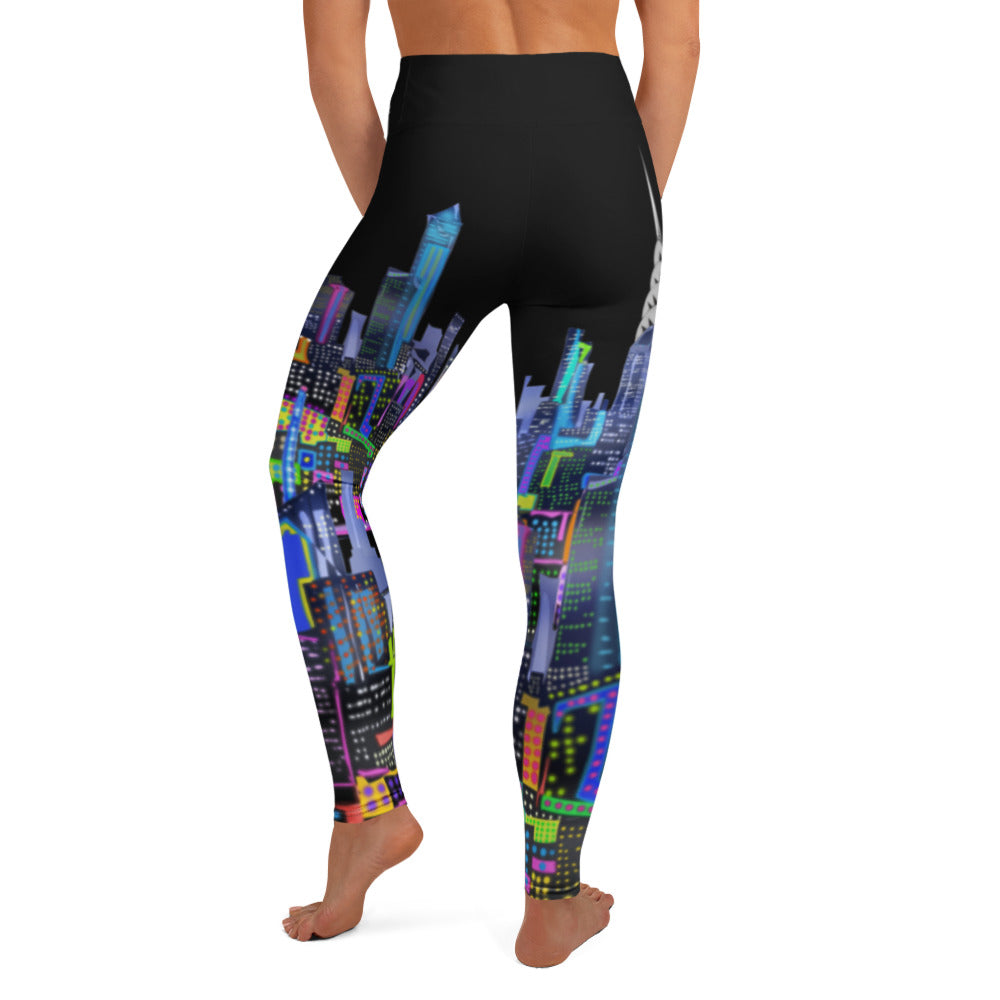 Black leggings with colorful cityscape  Loria NYC Art design worn by a person on a white background