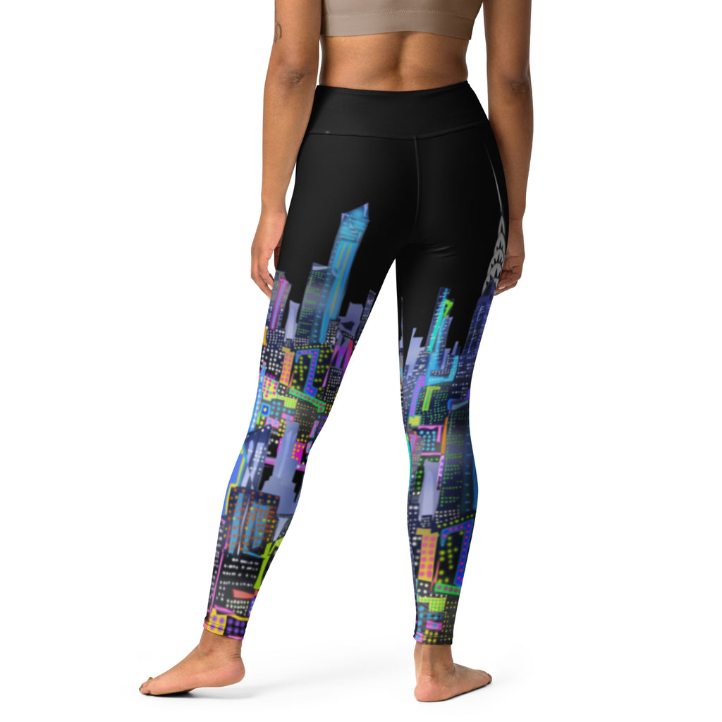 Black leggings with colorful cityscape  Loria NYC Art design worn by a person on a white background