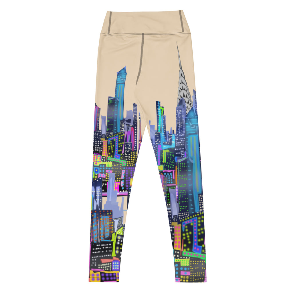 Beige leggings with colorful Loria NYC Art cityscape design on a white background