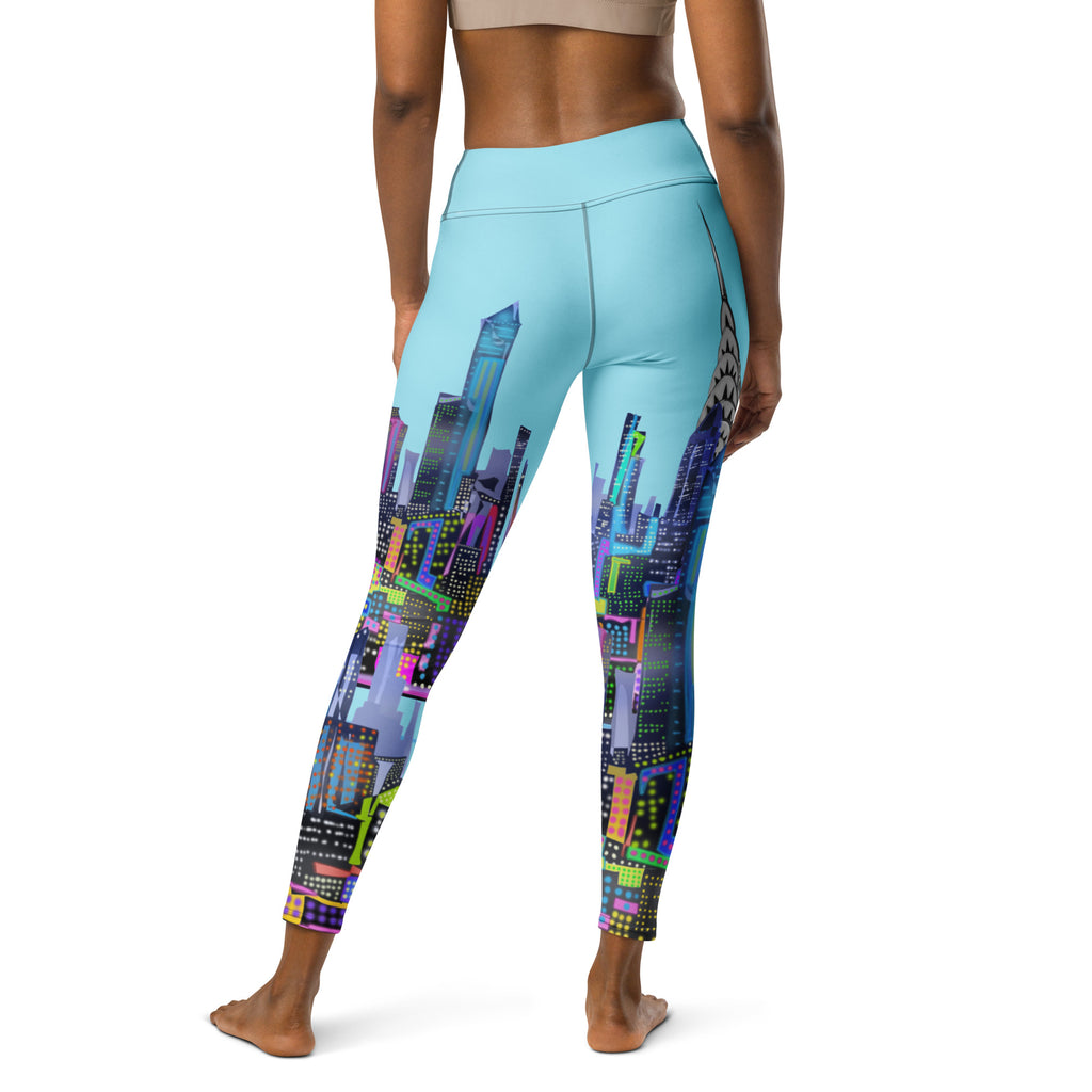 Rear of Leggings with a colorful Loria NYC Art cityscape pattern on a white background