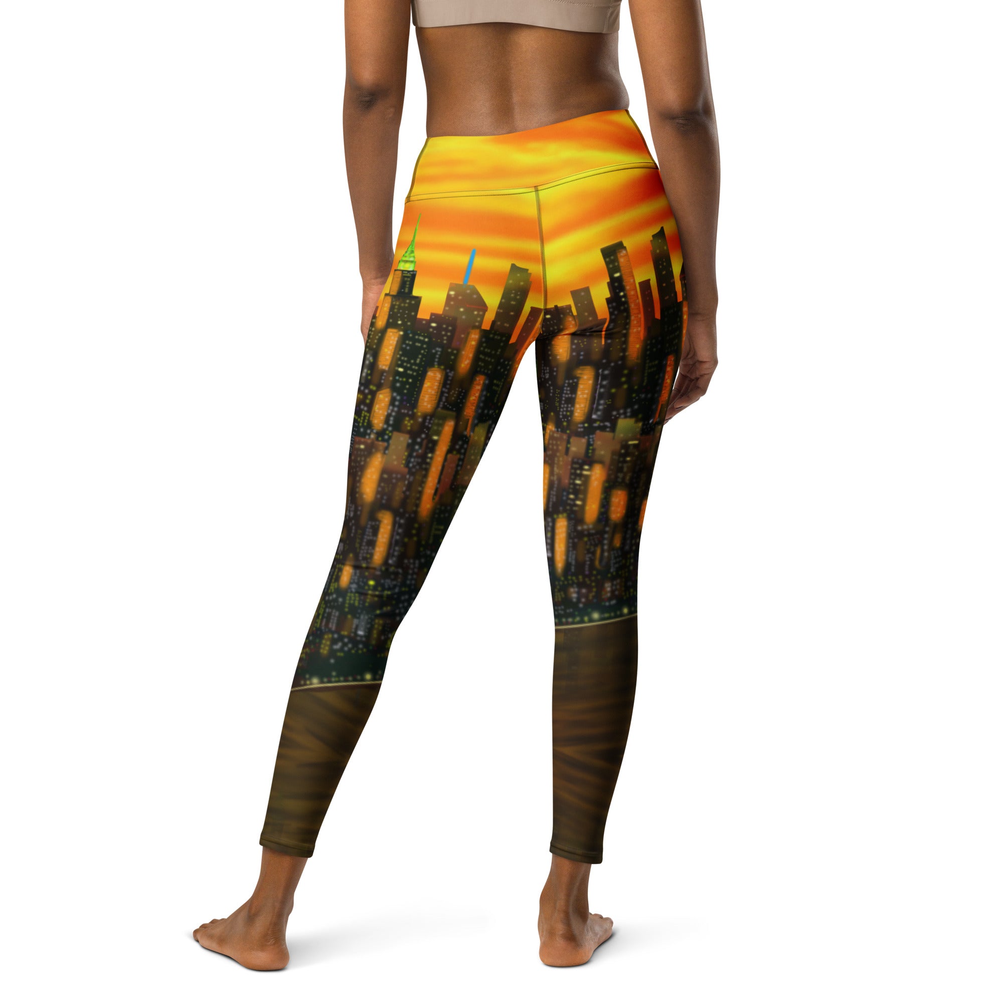 Leggings with a cityscape orange and black Loria NYC Art design on a white background