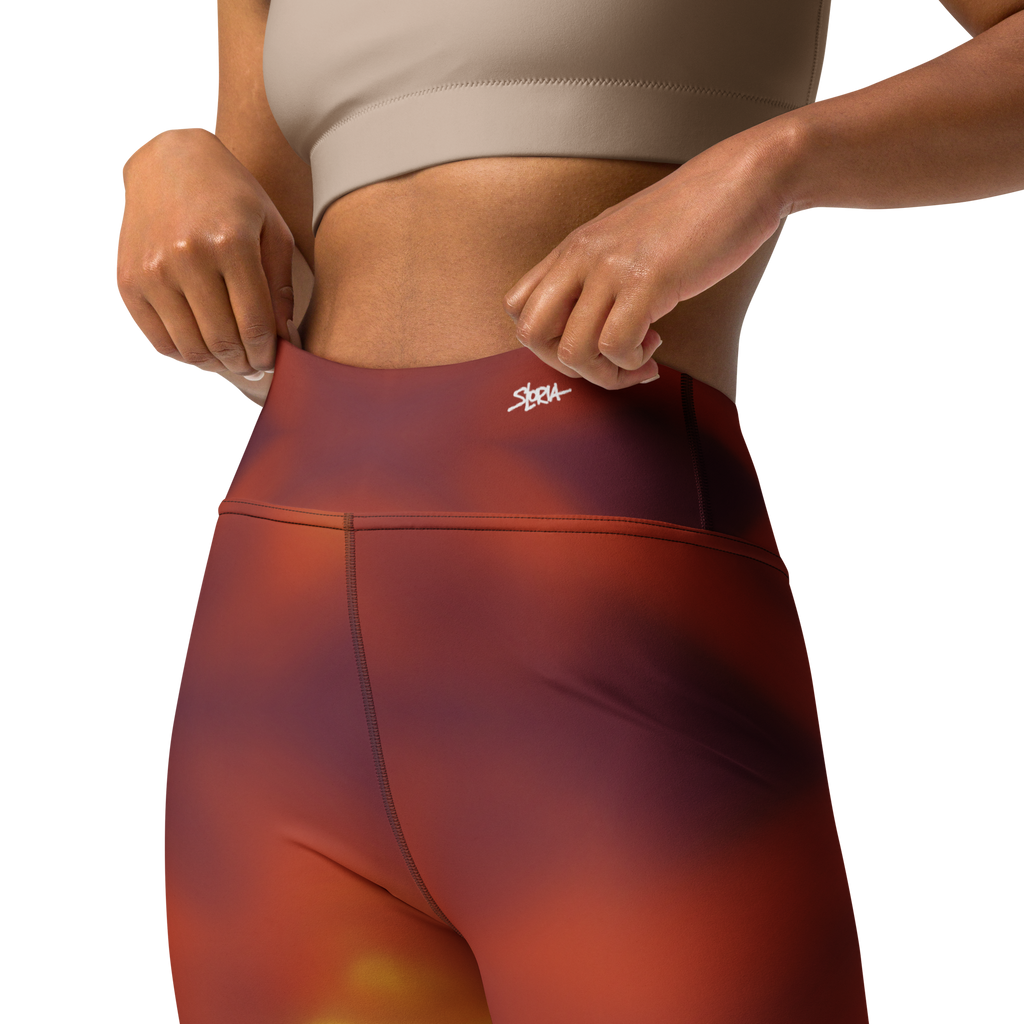 Red Loria NYC Art leggings with a brand logo on a white background