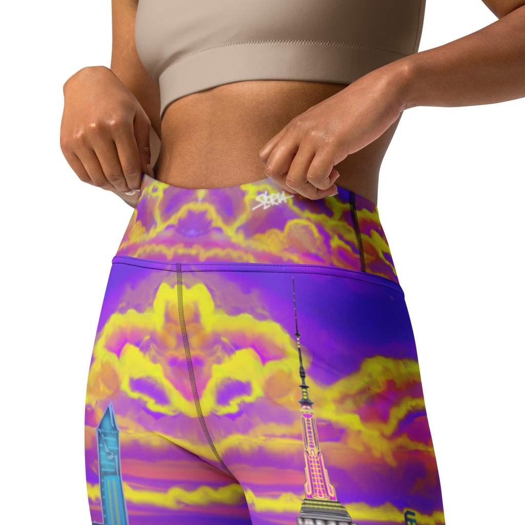 Colorful leggings with a Loria NYC Art cityscape design on a white background