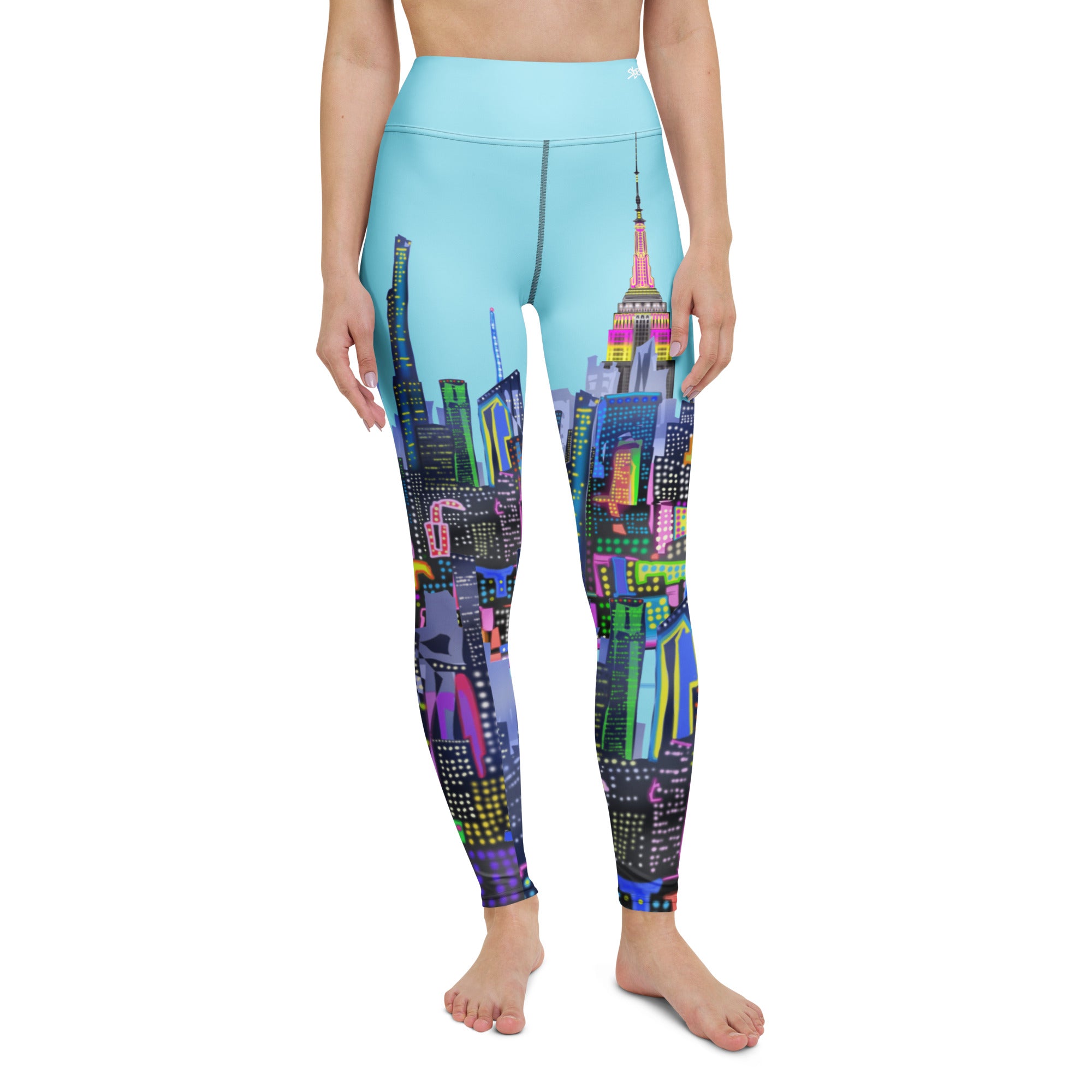 Leggings with a colorful Loria NYC Art cityscape design on a white background