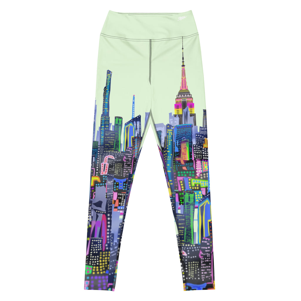 Front of Leggings with a colorful Loria NYC Art  cityscape design on a light green background
