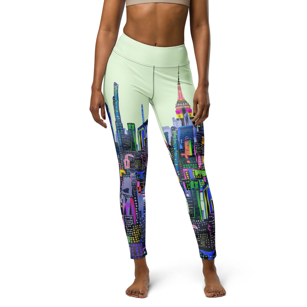 Leggings with colorful cityscape design by Loria NYC Art on a white background