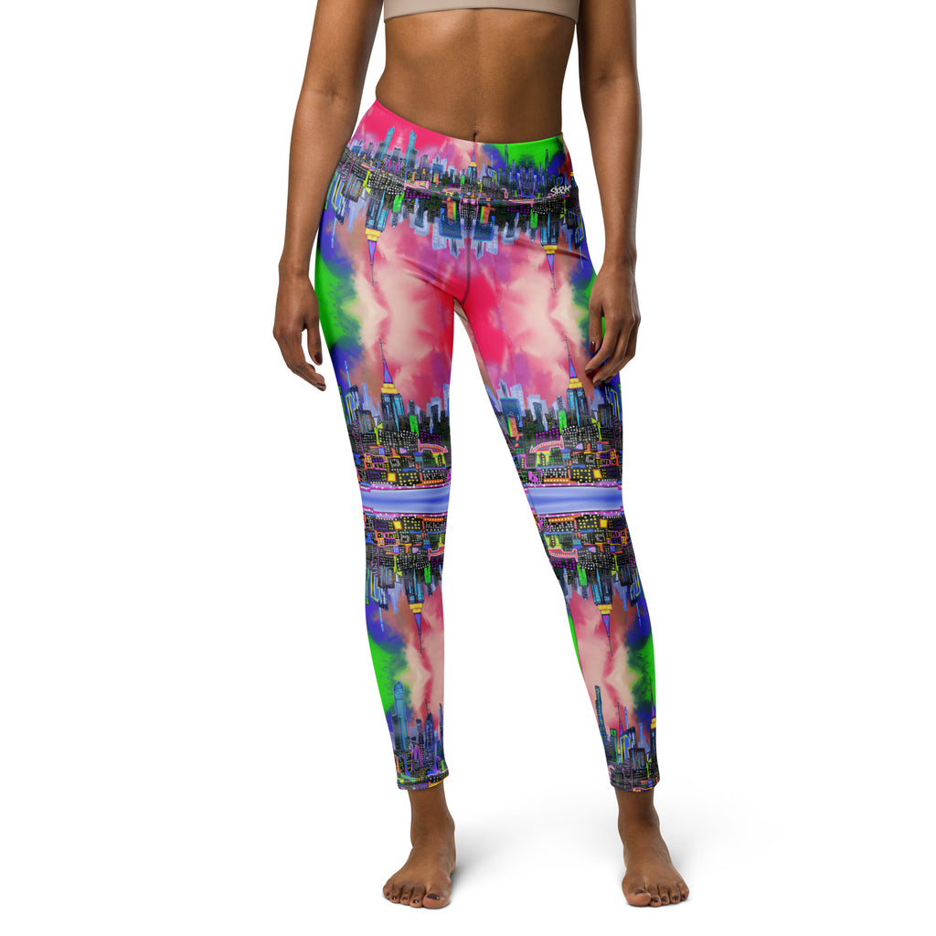 Multicolored tie-dye leggings designed by Loria NYC Art and worn by a person on a  white background