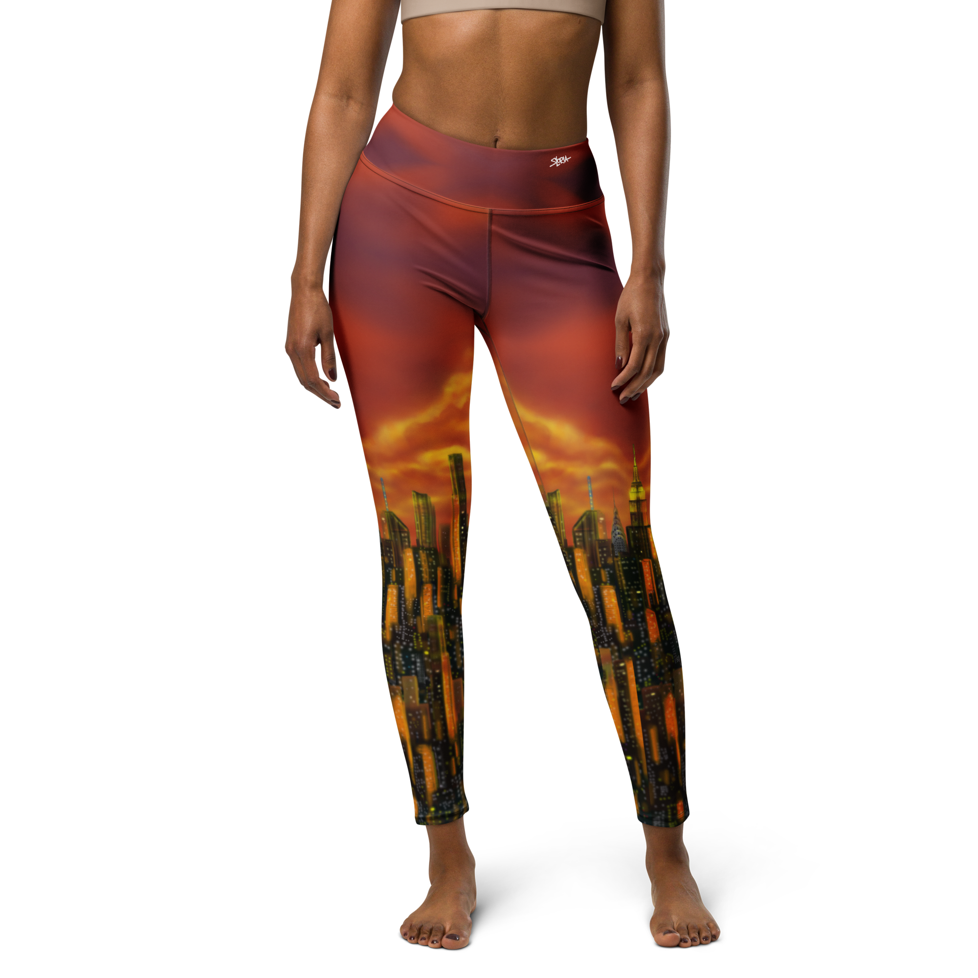 Leggings with a Loria NYC Art landscape design worn by a model on a white background