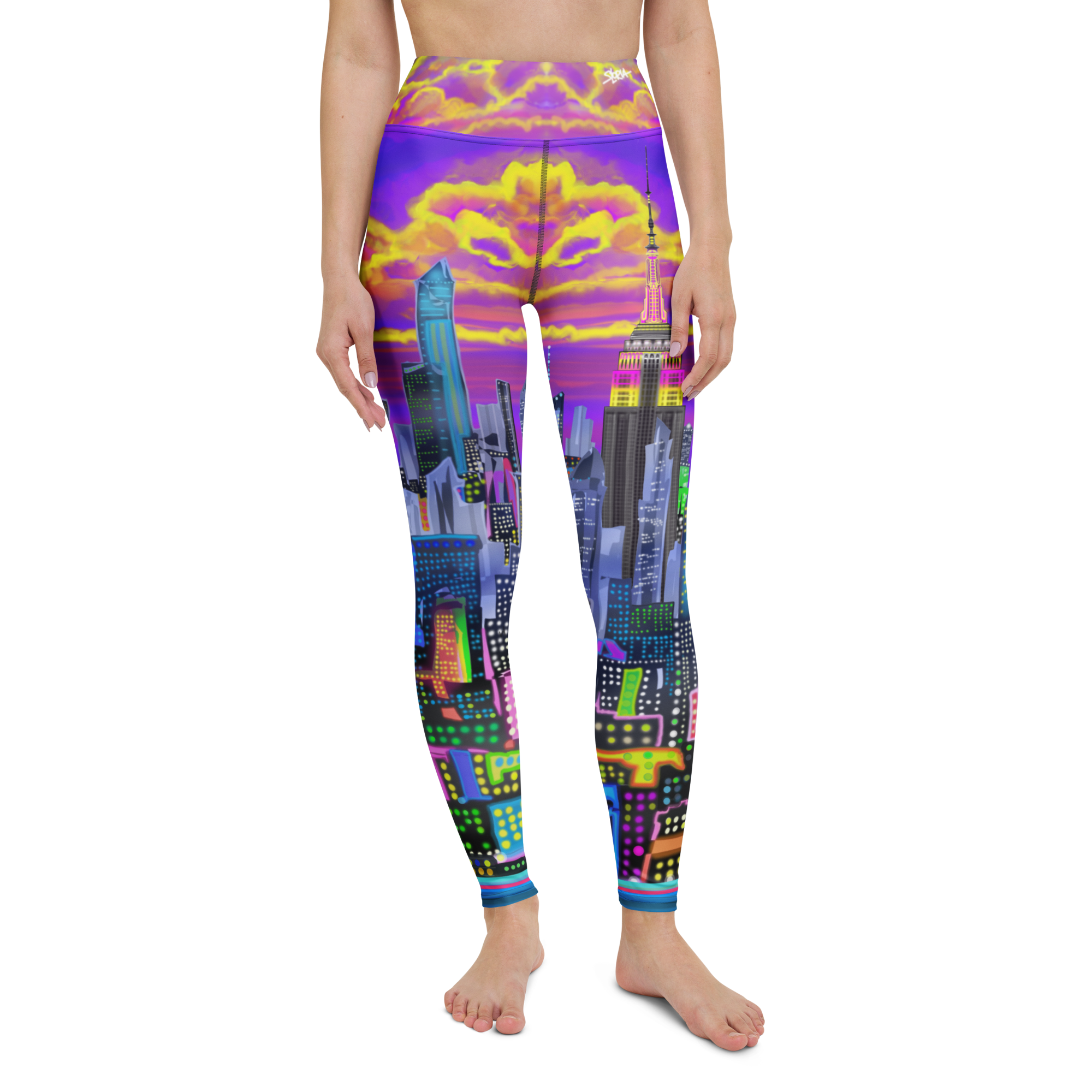 Colorful cityscape Loria NYC Art leggings worn by a person on a white background
