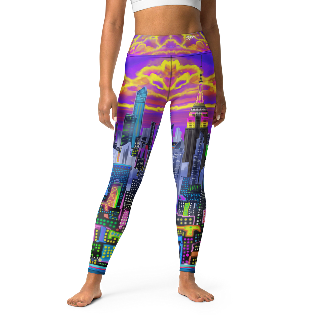 Colorful cityscape Loria NYC Art leggings worn by a person on a white background