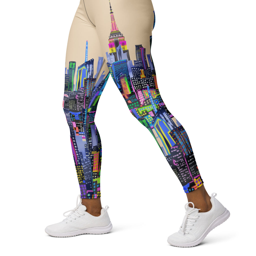Leggings with a Loria NYC Art colorful cityscape design worn by a person on a white background