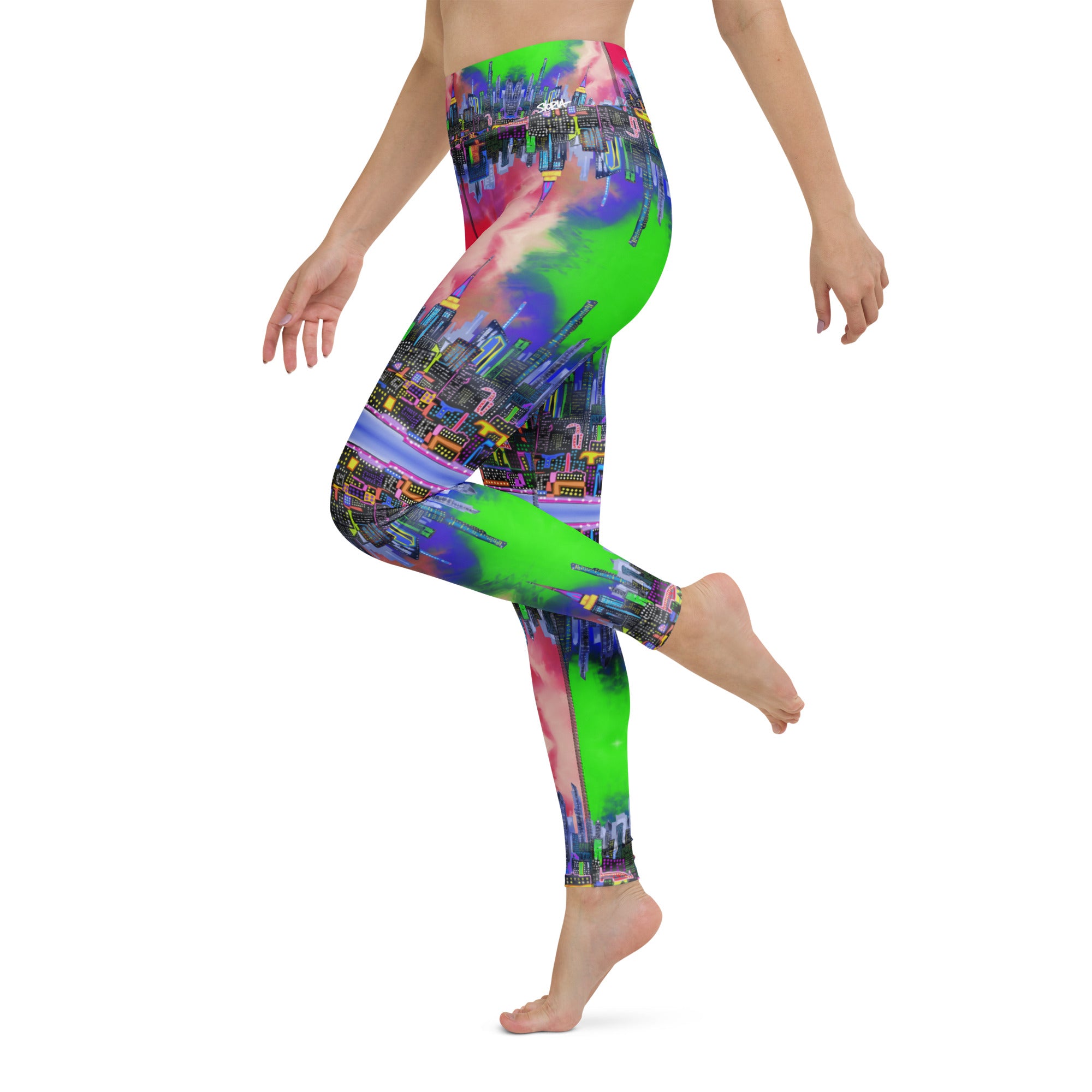 Multicolored tie-dye leggings designed by Loria NYC Art and worn by a person on a  white background