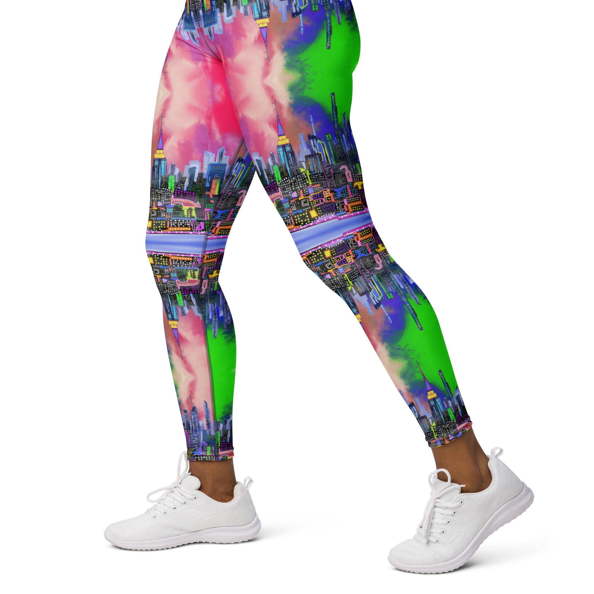 Multicolored tie-dye leggings designed by Loria NYC Art and worn by a person on a  white background
