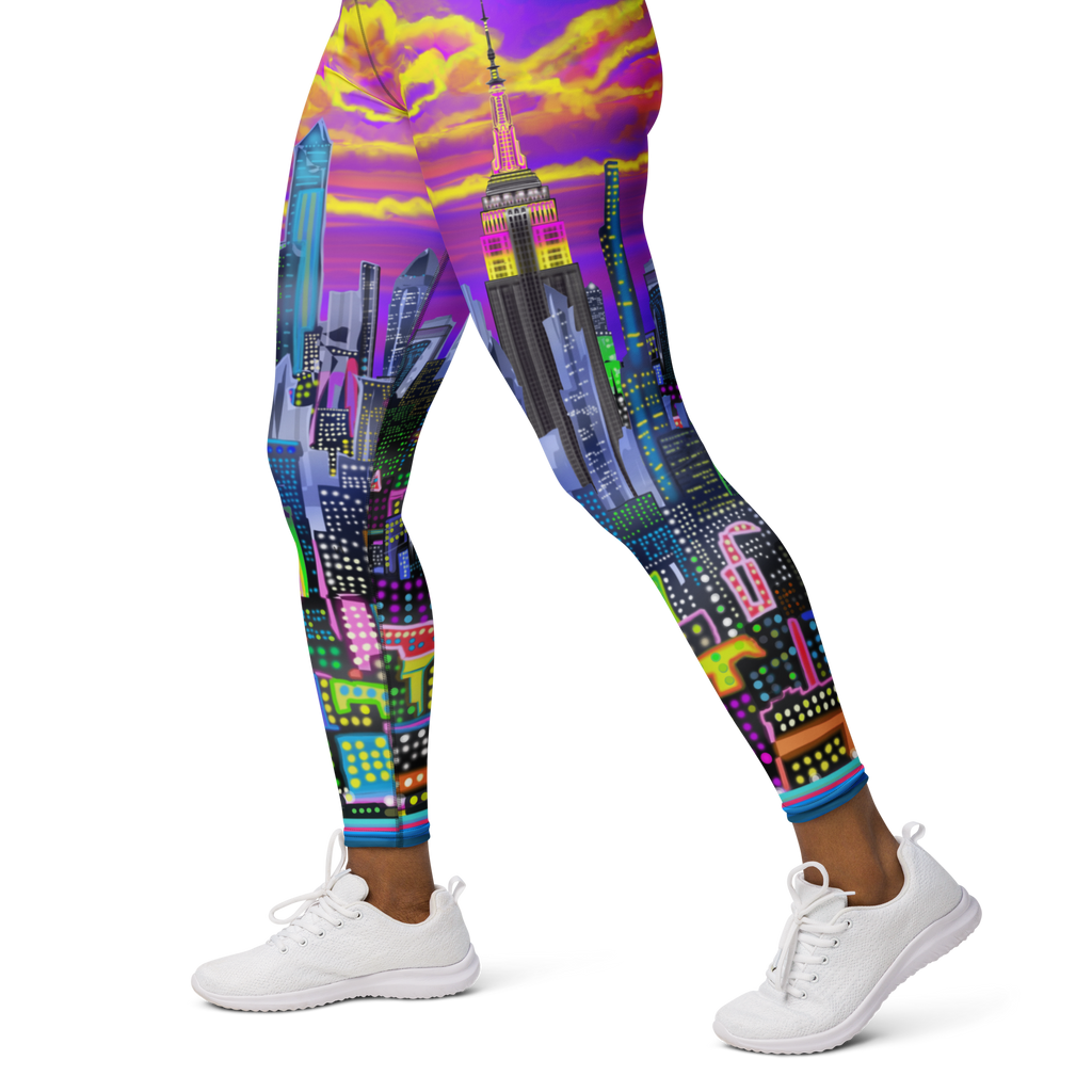 Colorful cityscape Loria NYC Art leggings worn by a person on a white background