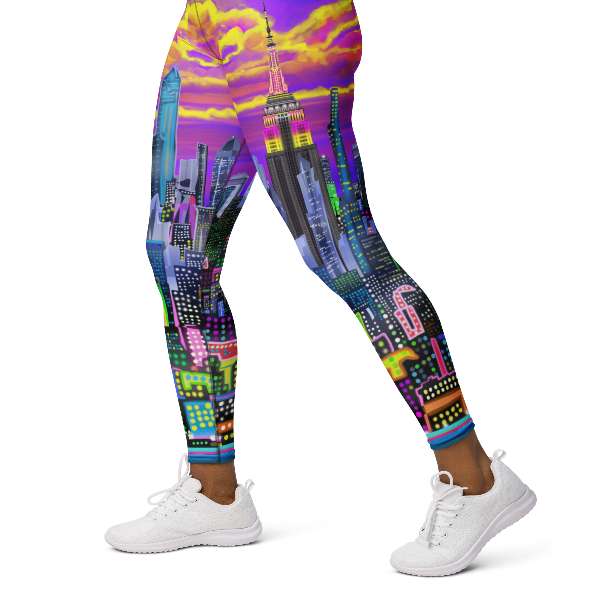 Colorful cityscape Loria NYC Art leggings worn by a person on a white background