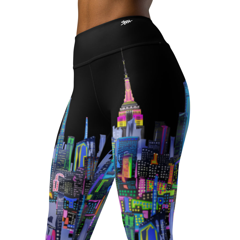 Leggings with a colorful  Loria NYC Artcityscape design on a black background