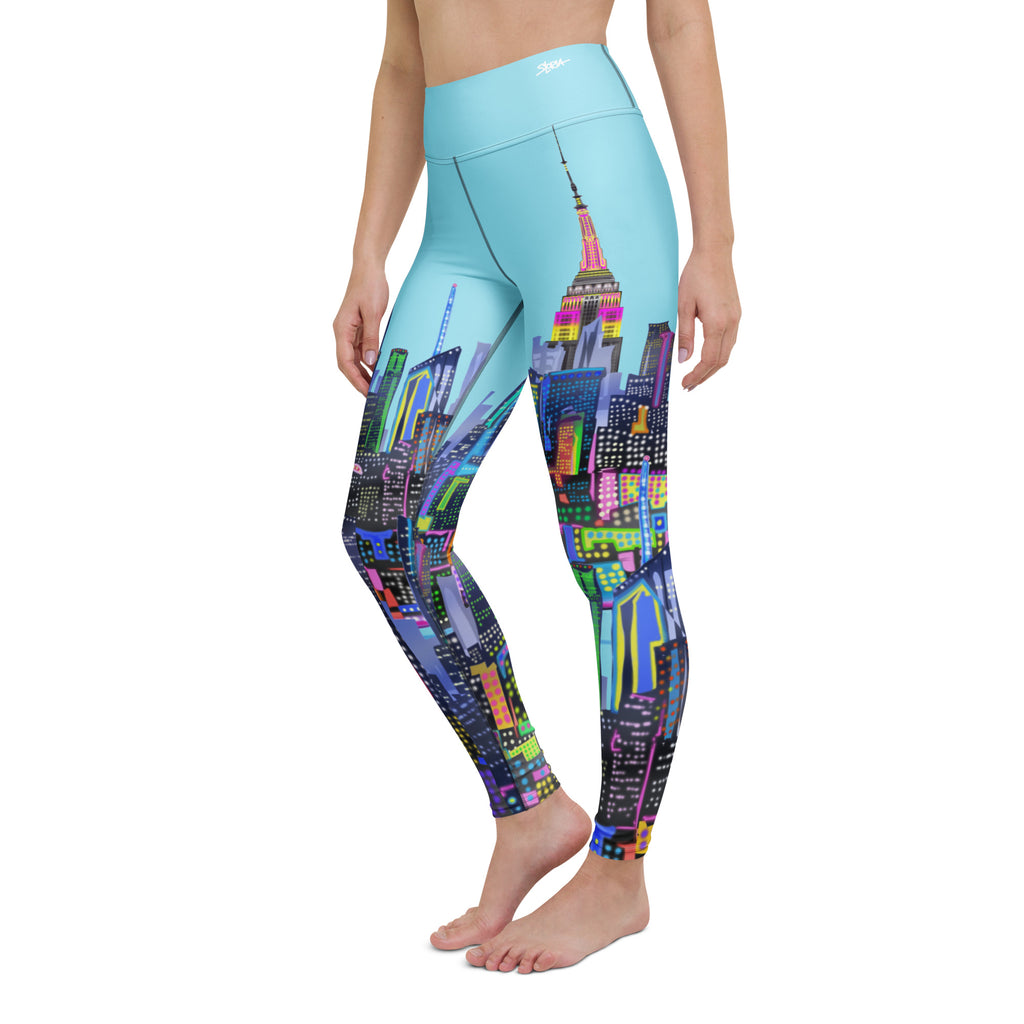 Loria NYC Art Leggings with a colorful cityscape design on a white background