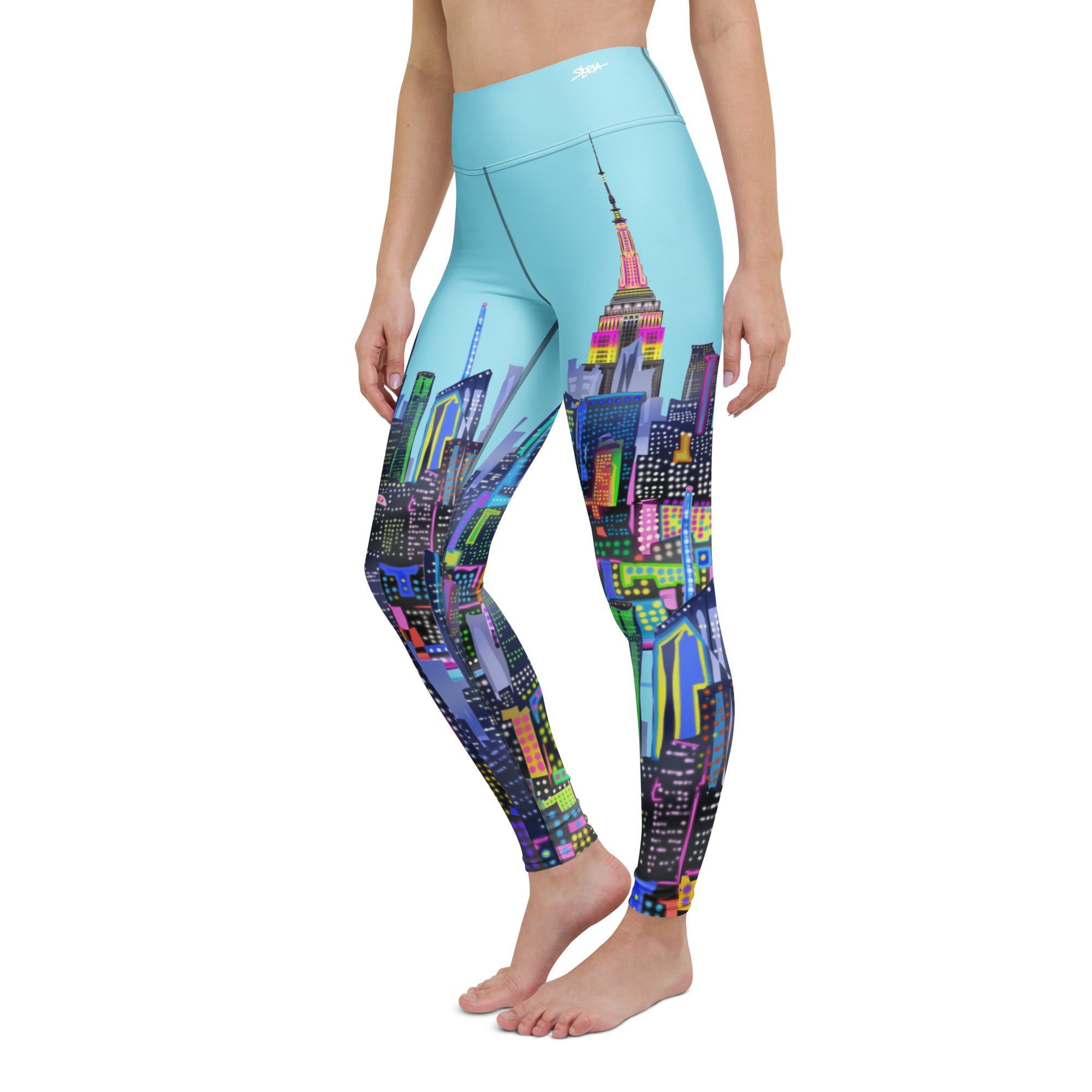 Loria NYC Art Leggings with a colorful cityscape design on a white background