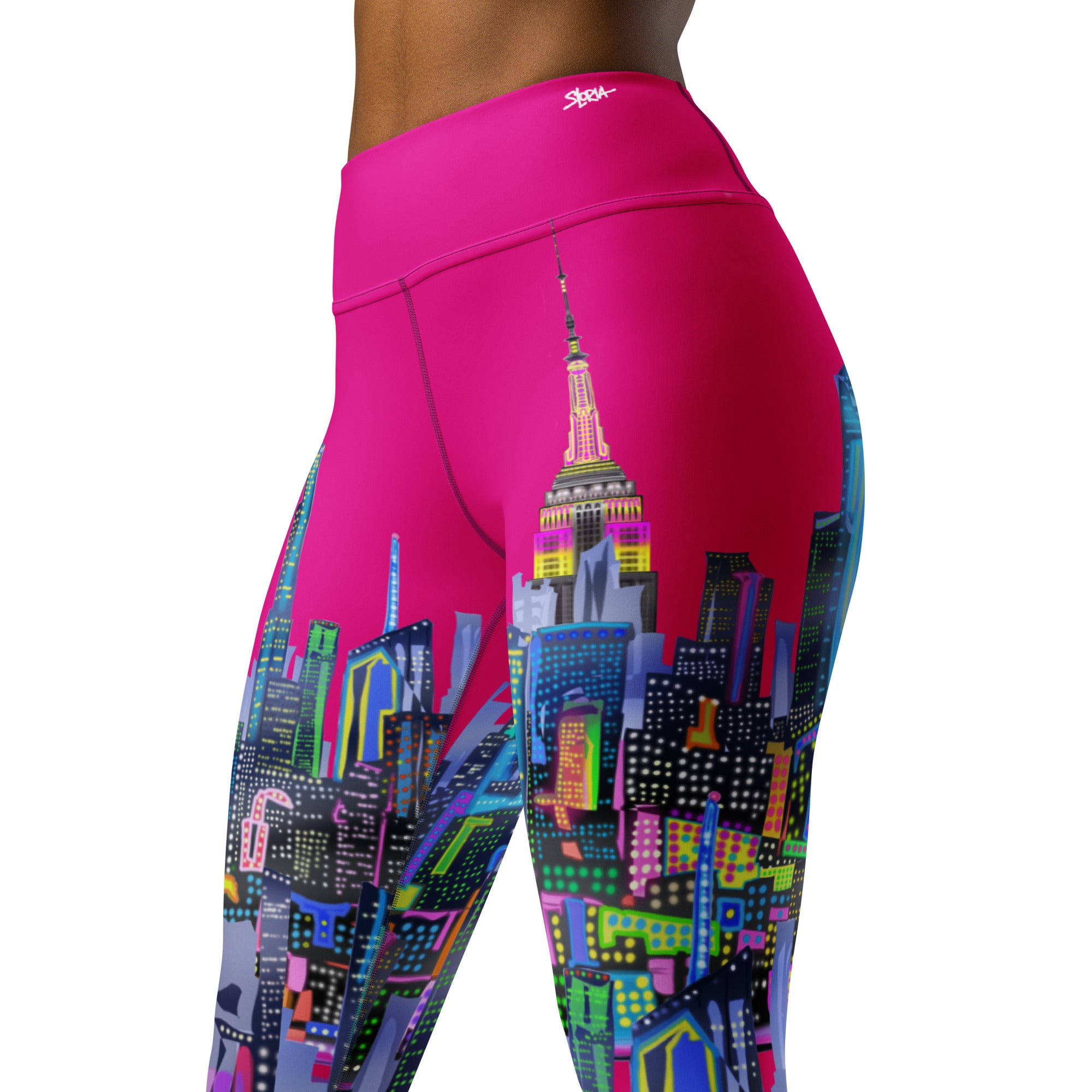 Fuchsia leggings with colorful Loria NYC Art cityscape design on a white background