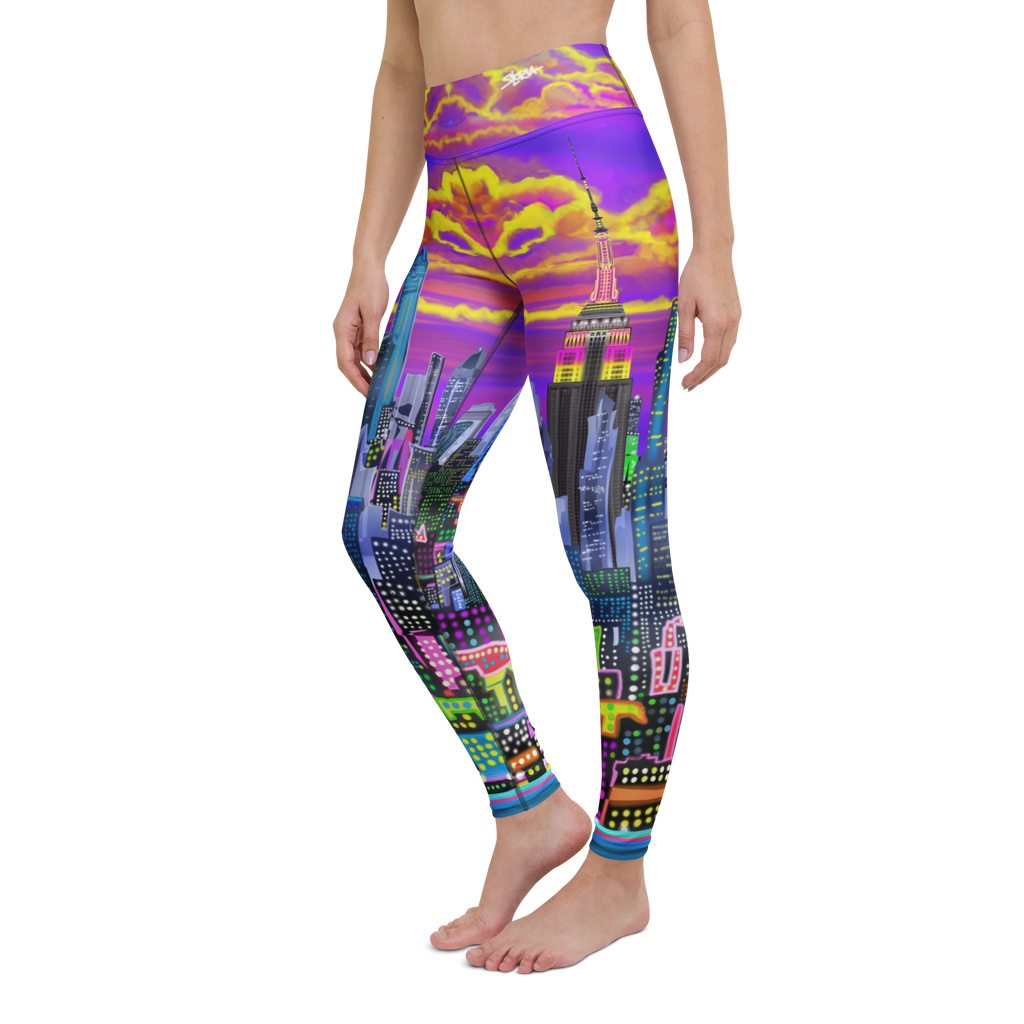 Colorful cityscape Loria NYC Art leggings worn by a person on a white background