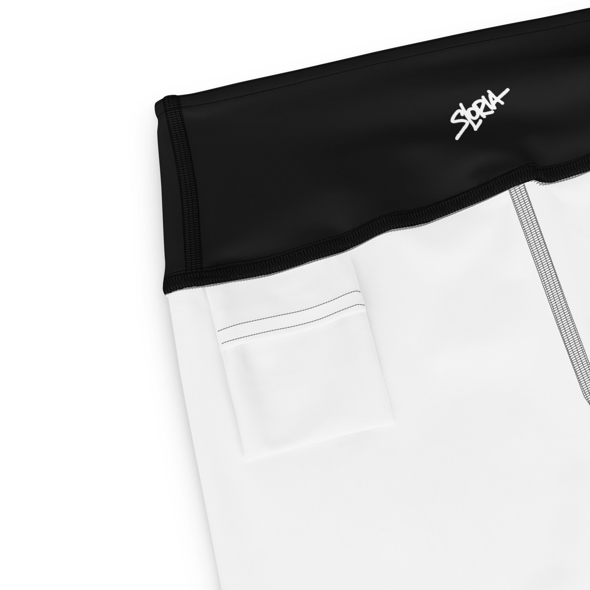 Close-up of a black waistband and pocket with white branding S.Loria on a white background