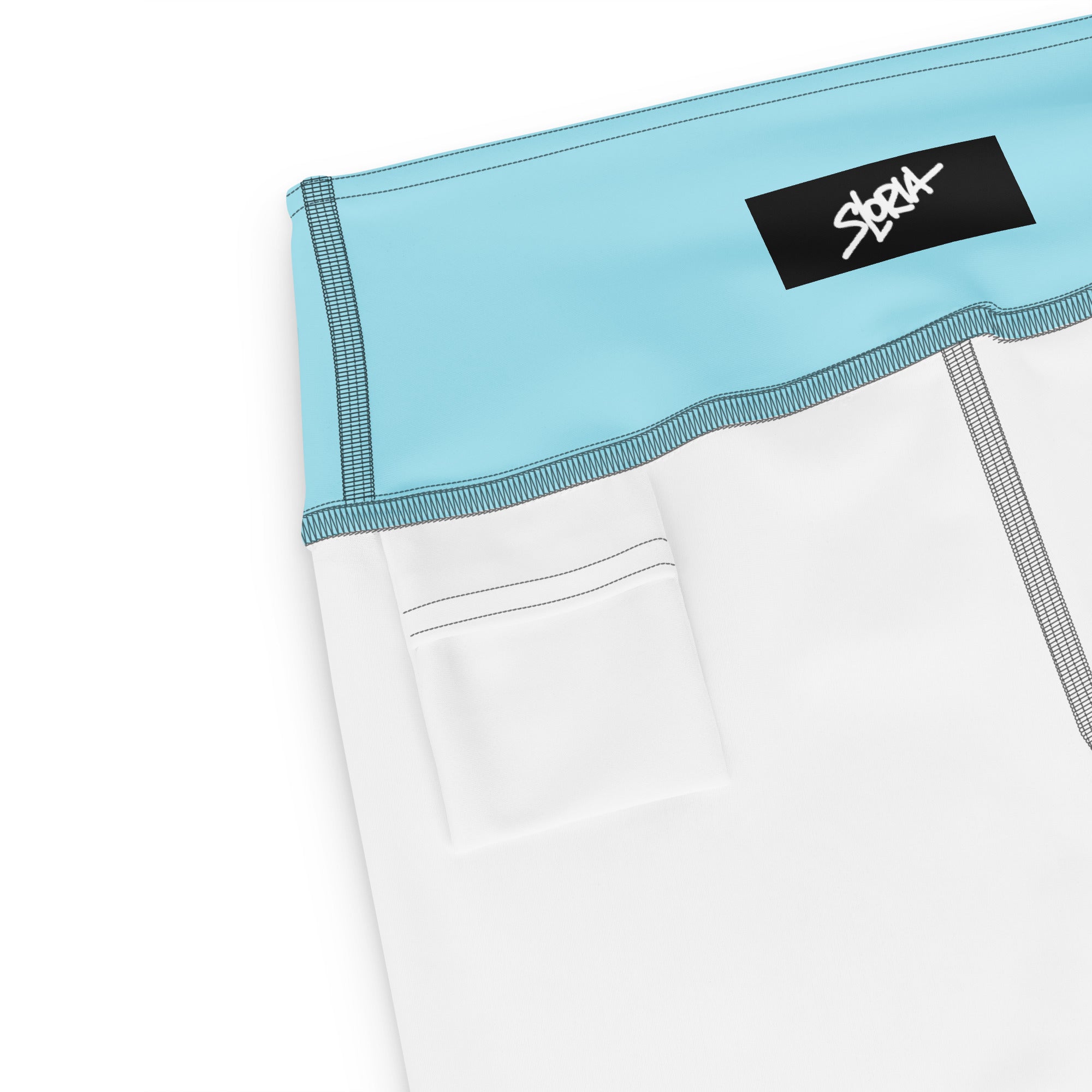 Close-up of white shorts with a light blue waistband and a brand S.Loria logo on a white background