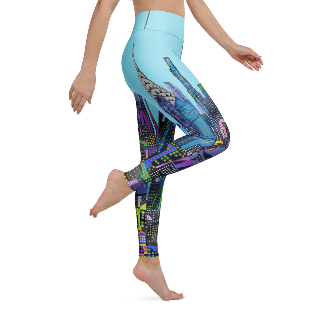 Colorful Loria NYC Art patterned leggings worn by a person on a white background