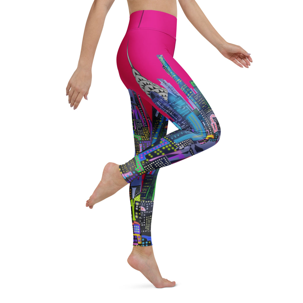 Colorful patterned Loria NYC Art  leggings worn by a person on a white background