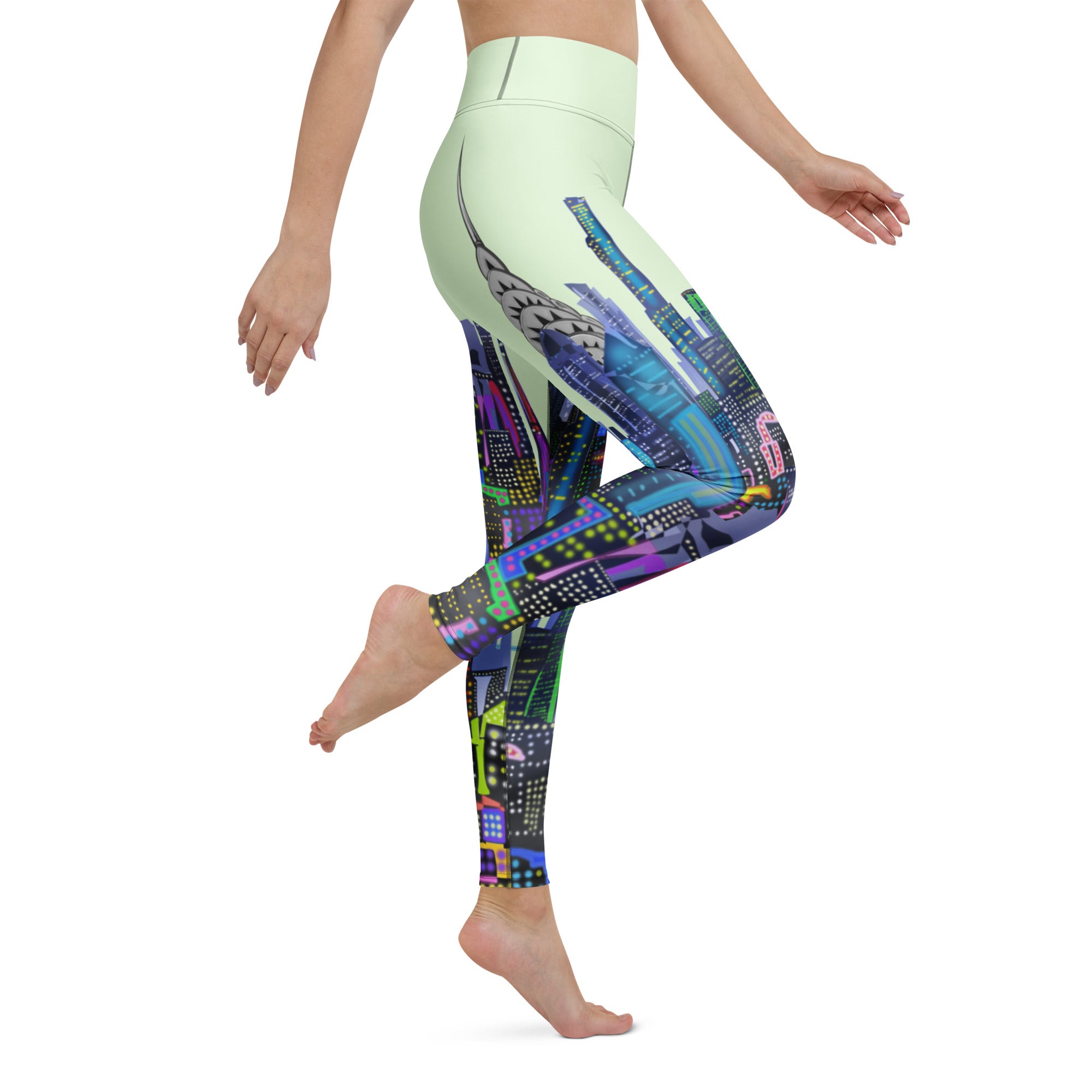 Colorful Loria NYC Art patterned leggings worn by a person on a white background