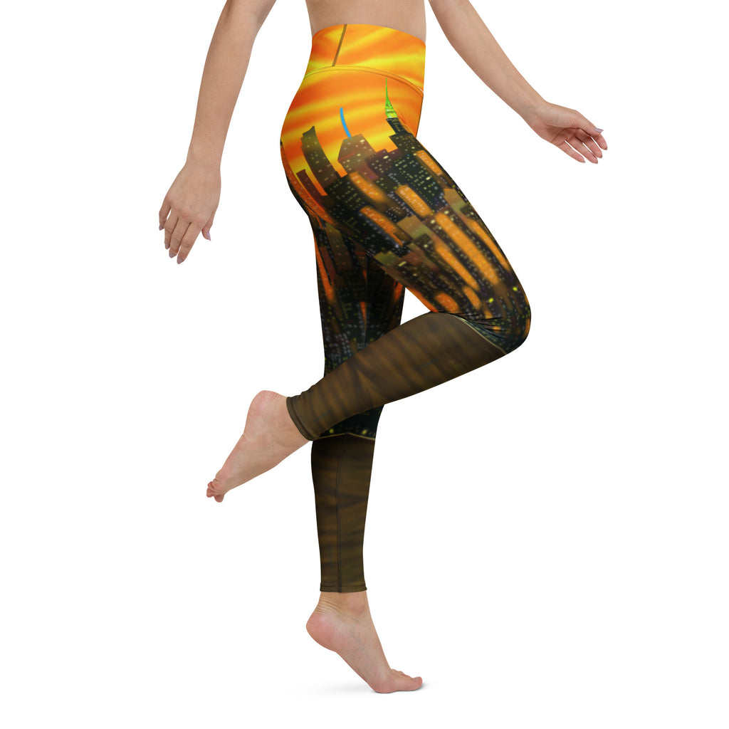 Side of orange Leggings with a Loria NYC Art design of a cityscape on a white background