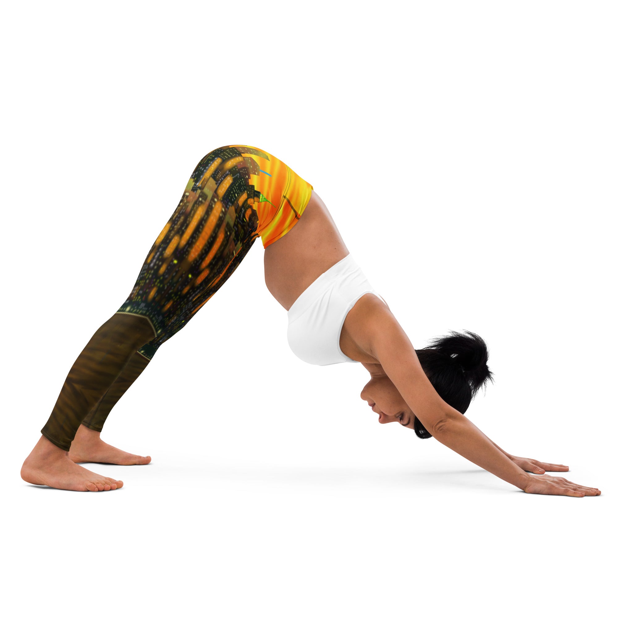 Person wearing colorful Loria NYC Art leggings and a white top in a yoga pose on a white background