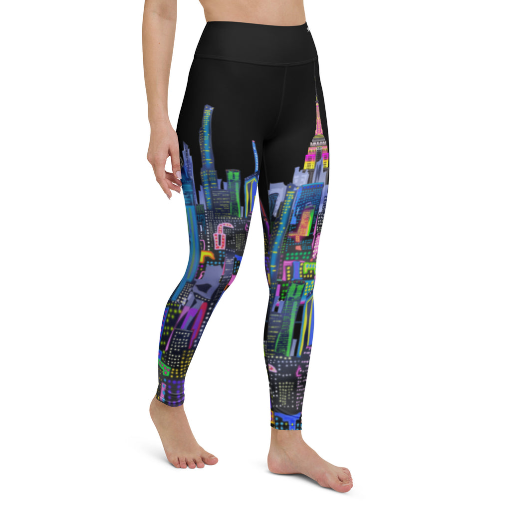 Black leggings with colorful cityscape  Loria NYC Art design worn by a person on a white background
