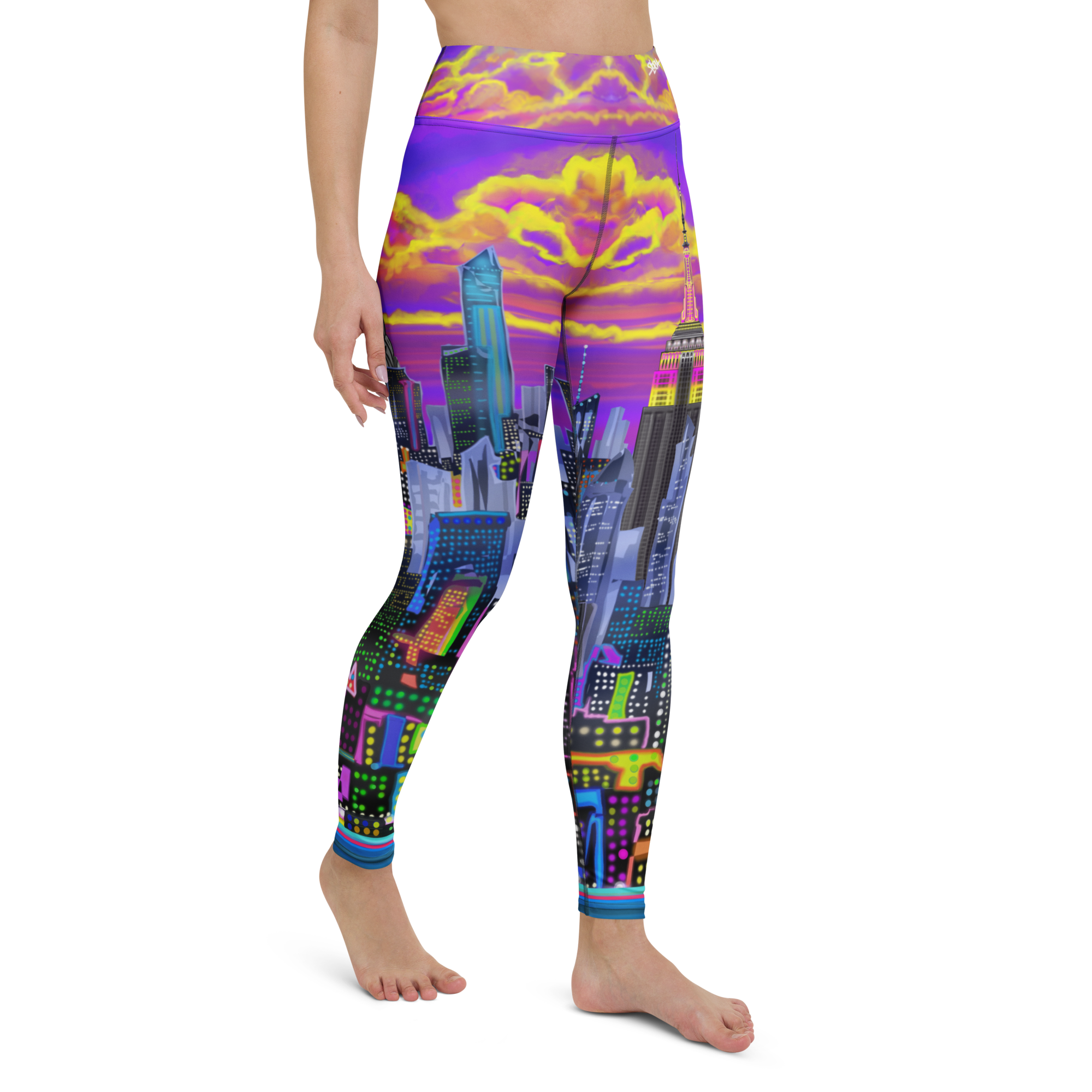 Leggings with a colorful Loria NYC Art cityscape design on a white background
