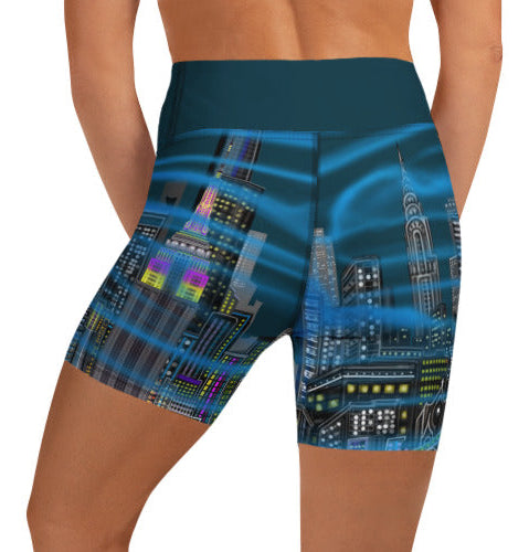 Person wearing blue patterned shorts on a white background