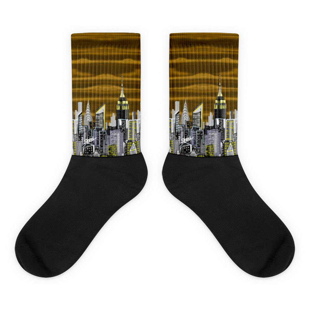Black socks with Loria NYC Art cityscape design on a white background