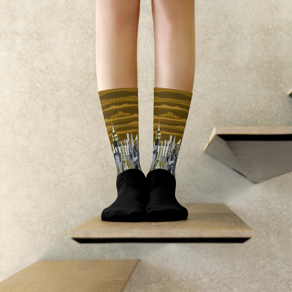 Person wearing socks with a Loria NYC Art cityscape design on a neutral background