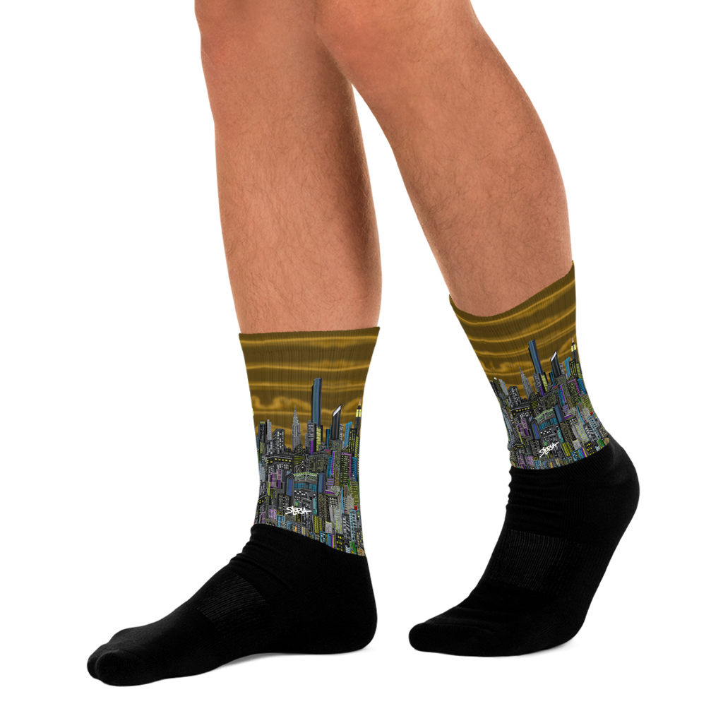 Cityscape Loria NYC Art socks worn by a person on a white background