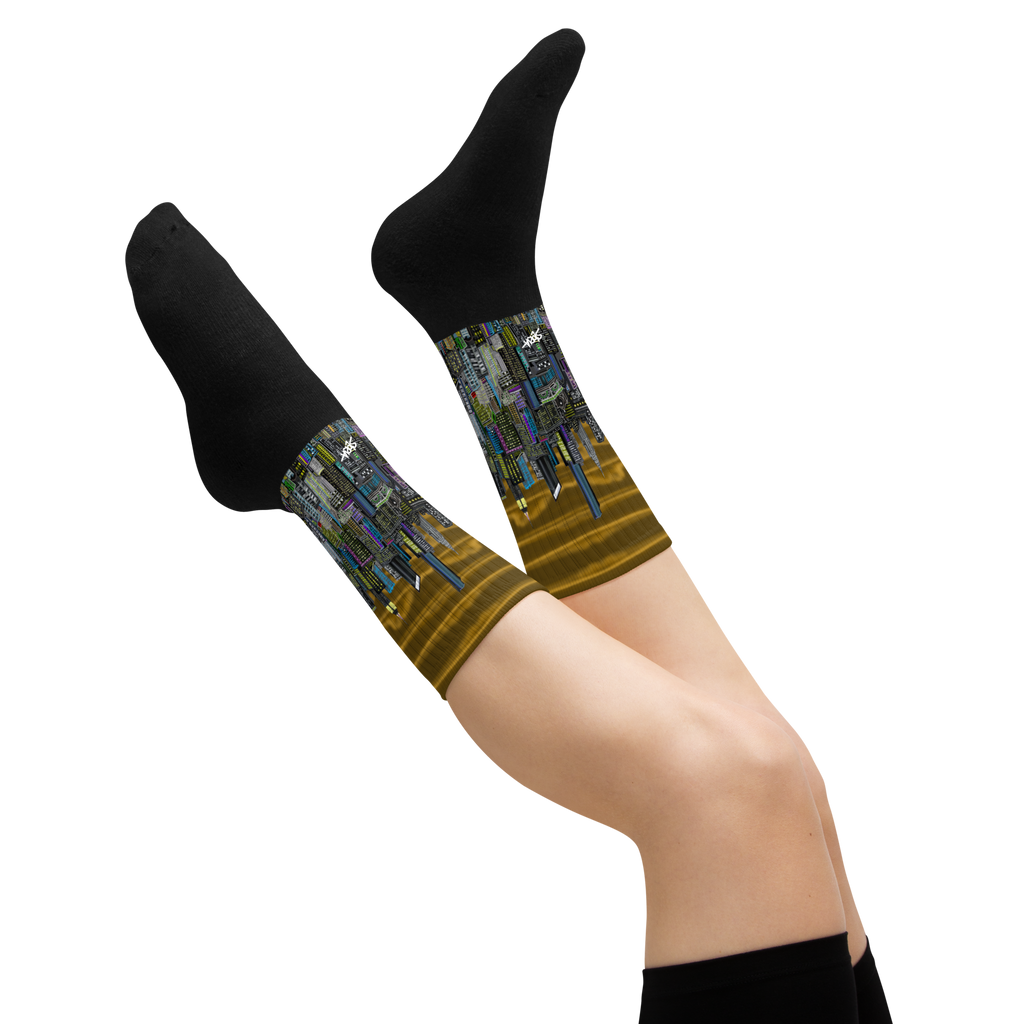 Legs wearing black socks with a Loria NYC Art cityscape design on a white background